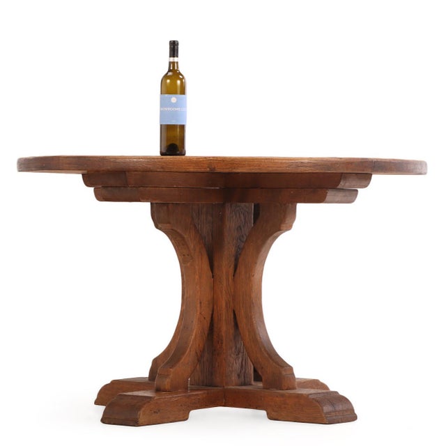This striking 1940s brutalist dining table is masterfully crafted from substantial, solid oak. Its monumental pedestal...