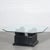 Modern faux black marble coffee table with 4 spheres holding glass top with beveled edge. Coordinating side table...