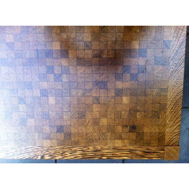 This coffee table, designed by Danish architect Gorm Lindum, features a simple, rectangular Wengé Wood construction...