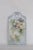 This gorgeous cutting board is made of ceramic. This piece features a beautiful hand painted design of yellow flowers on a...