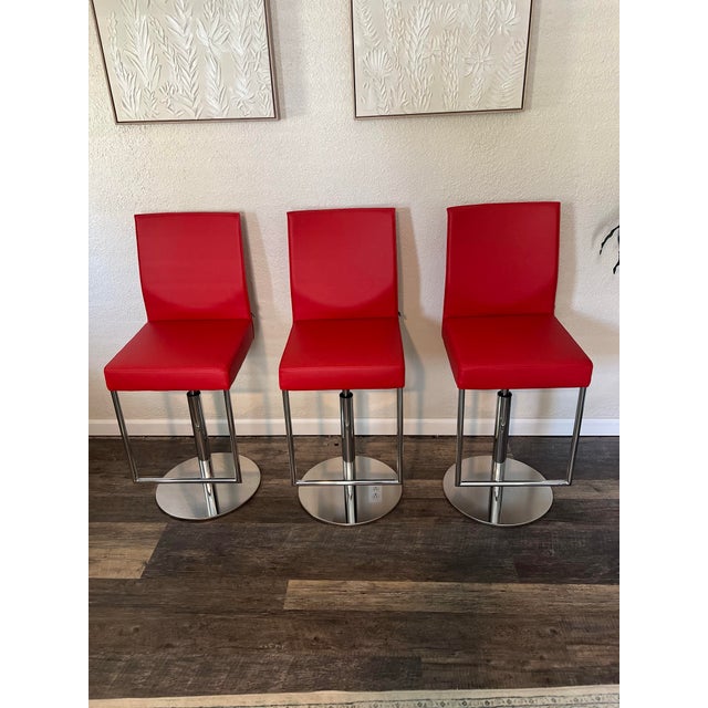Three customizable Glooh bar stools by KFF. Brand new in the box never used. These chairs have been stored in our basement...