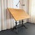 This early 20th-century industrial drafting table was manufactured by Keuffel & Esser circa the early 1900s. It's a prime...
