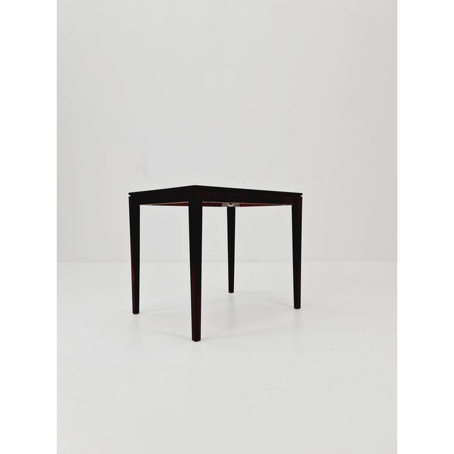 Danish vintage rosewood coffee table/side table from the 60s Design year: 1960s Dimensions: : 40 D x 52 W x 46 H cm It is...
