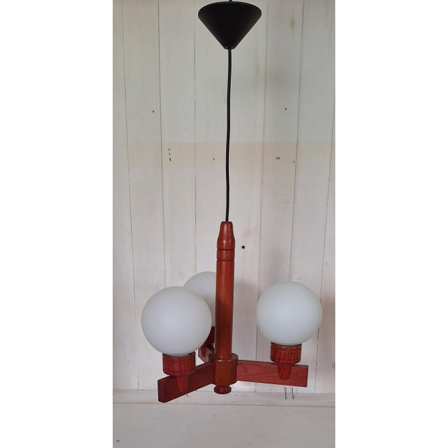 Vintage Hanging Lamp in Pine, 1970s, in Very Good conditions. Designed 1970 to 1979 Up to 250V (Europe/UK Standard).The...