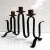 French Modernist Ondulation Candlestick attrib. to Jean Royere. Steel, topped with copper candle votives.