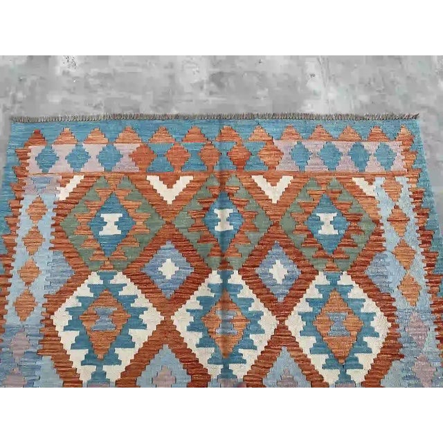 Hand-Woven Kilim Rug | Vibrant Orange and Blue Diamond Patterns From Nomad Carpets For Sale - Image 4 of 11