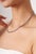 This elegant necklace features a 7.5-carat round black diamond, set in 18k white gold. The diamond sizes are approximately...