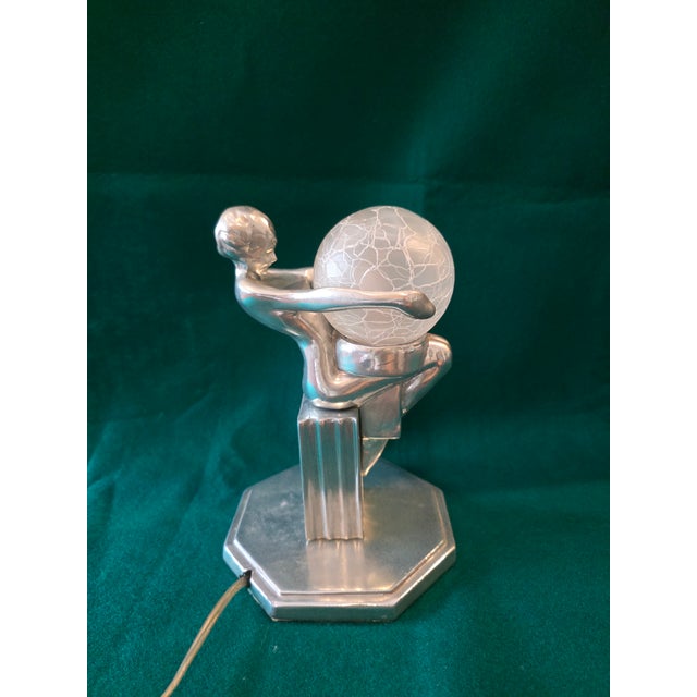 Vintage Frankart Sasperella Art Deco style accent table lamp, featuring a graceful nude female form holding a crackled...