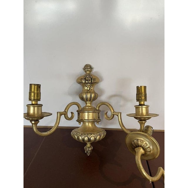 Pair Of Wall Light Sconces. Sizes :- 31 cms high x 34.5 cms wide Need a clean, some old paint on the edges. Not Tested. Up...