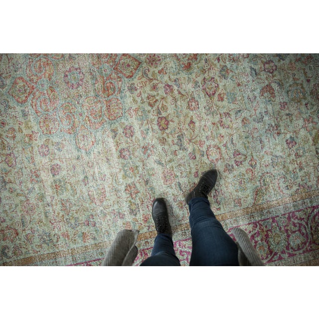 :: Center medallion with scalloped contour with scrolling arabesques and Islimis, atop a covered field of delicate...