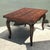 Beautifully crafted with timeless elegance, this vintage extendable dining table showcases an eye-catching herringbone...