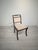 An elegant Empire-style chair, reminiscent of classic European 19th-century design. The chair impresses with its refined,...