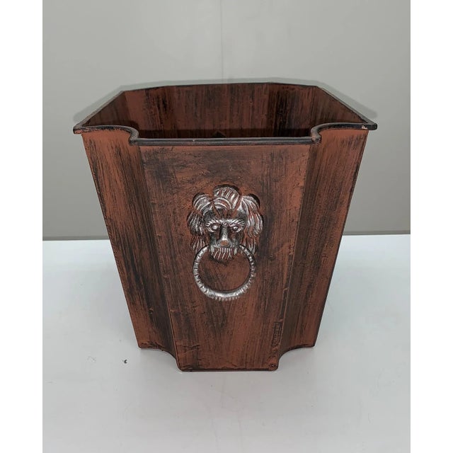 This is a patterned metal planter. It's washed over look in the metallic finish gives it a rustic character while still...