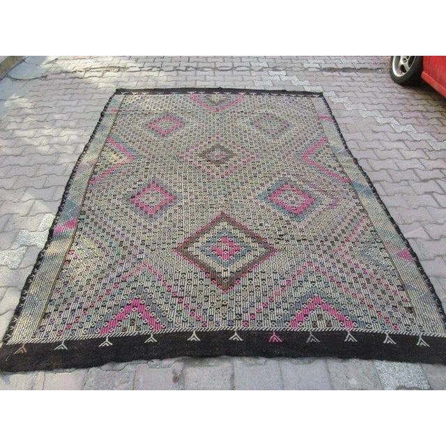 Handwoven vintage Kilim rug from denizli region of turkey. Approximately 50-60 years old.In very good condition.