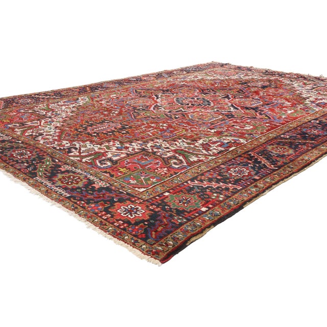 79021 Antique Persian Heriz Rug, 07'10 x 11'06. This exquisite hand-knotted wool antique Persian Heriz rug is a masterful...