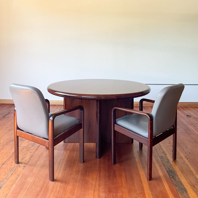 Gorgeous mid century modern Dyrlund “Supreme” dining table in rosewood, circa 1970s. From the Supreme model line, designed...