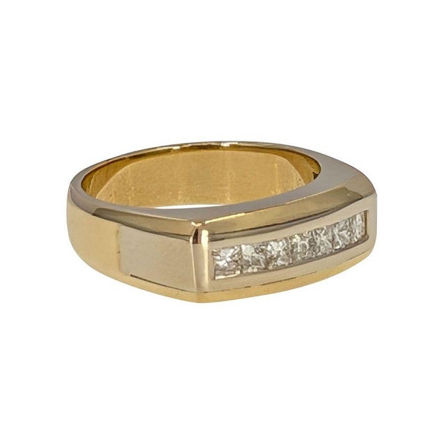 Estate Gents Two Tone Gold Diamond Wedding Band. This beautiful two tone 14 karat gold men's ring features 7 princess cut...