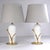 A pair of striking lamps made of glazed and gilded ceramic placed on metal bases. They come from Italy in the 1980s. E27...