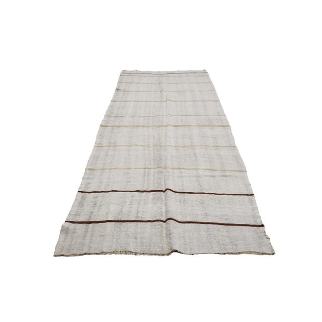 Handwoven vintage hemp kilim rug from Yozgat region of Turkey. Approximately 45-55 years old. In very good condition.