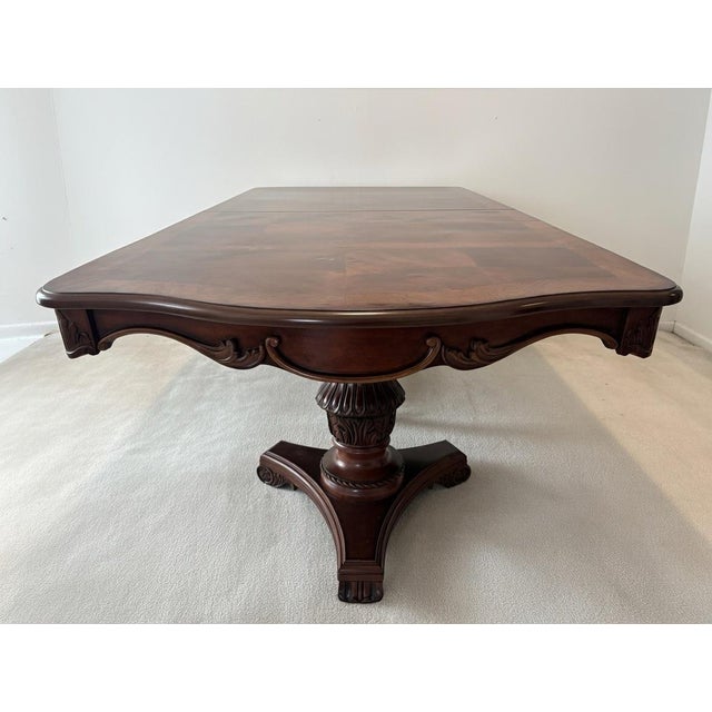 Two Pedestals and elegant Queen Anne design. Two extensions provide masterful versatility. Room enough to accommodate 10...