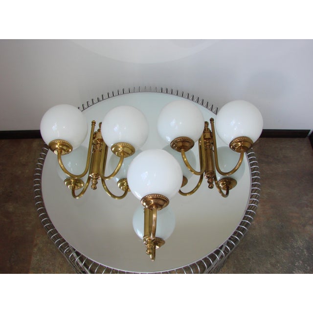 Vintage Brass Wall Lights with Frosted Glass Globes, 1960s, Set of 3, in Very Good conditions. Designed 1960 to 1969...