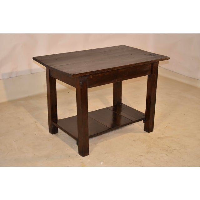 Circa 1910 American walnut work table made by the Acme Kitchen Furniture Company of Chattanooga, TN. This table is a...