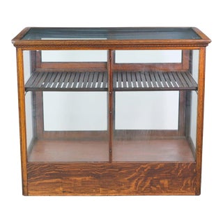 Early 20th Century Antique Tiger Oak Egg & Dart Display Cabinet With Sliding Doors For Sale