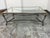 Design Plus Gallery presents a 1980's Hollywood Regency Glass Top Lion Coffee Table. This coffee table has a rectangular...