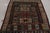 This Antique tribal kazak rug, handmade in wool, in Teal, with red and blue all over geometric patterns showcases the...