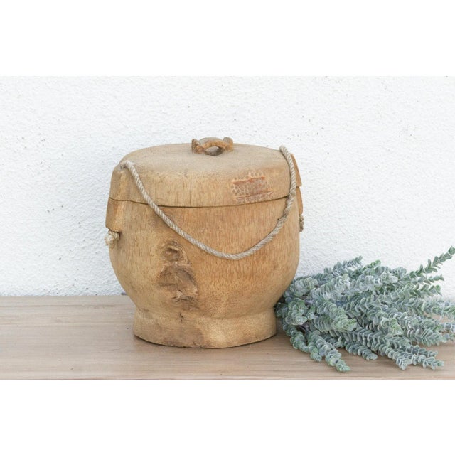 Discover the rustic charm and enduring craftsmanship of traditional artistry with this delightful wooden bowl with lid and...