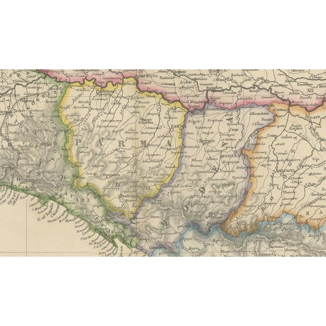 This finely detailed antique map depicts northern italy during the pivotal period of italian unification, capturing the...