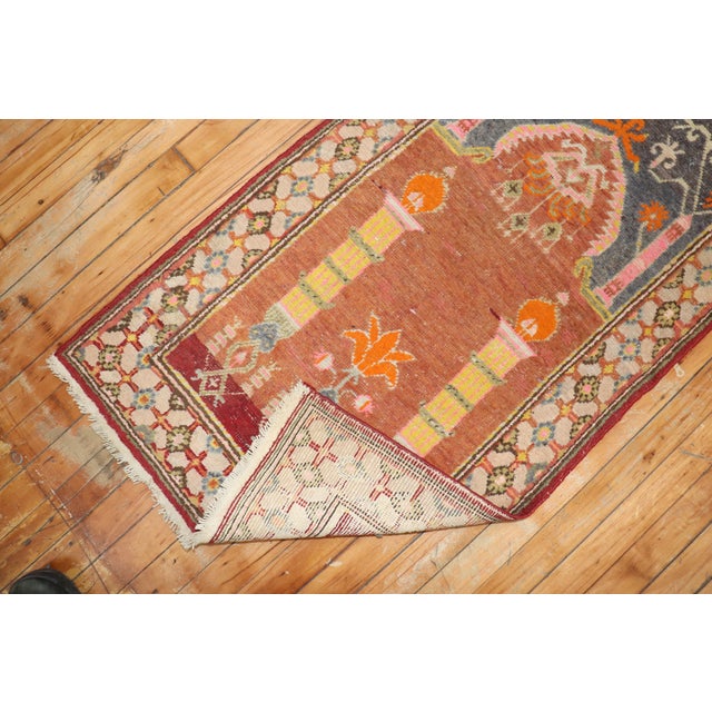 Rare Prayer niche pattern Khotan small size rug from the early 20th century. we have never seen an east Turkestan Khotan...