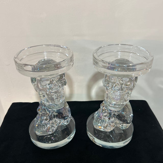 Stunning pair of clear crystal skull candleholders. Excellent quality with an opulent finish.