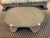 Oval bamboo with glass top coffee table. Has no marks, but in the style of Ficks Reed. Base measures 27x41