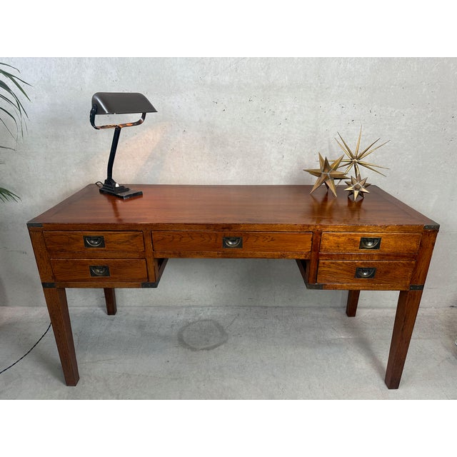 High-quality desk in campaign design. Sleek and functional design with minimal frills. Brass details characteristic of...