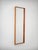 Swedish mirror from the 1960s attributed to Arne Wahl Iversen, featuring a slender rectangular structure and a refined...