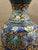 An elegant mid-century Chinese cloisonné enamel vase handcrafted over a gilt brass body. Decorated with intricate...