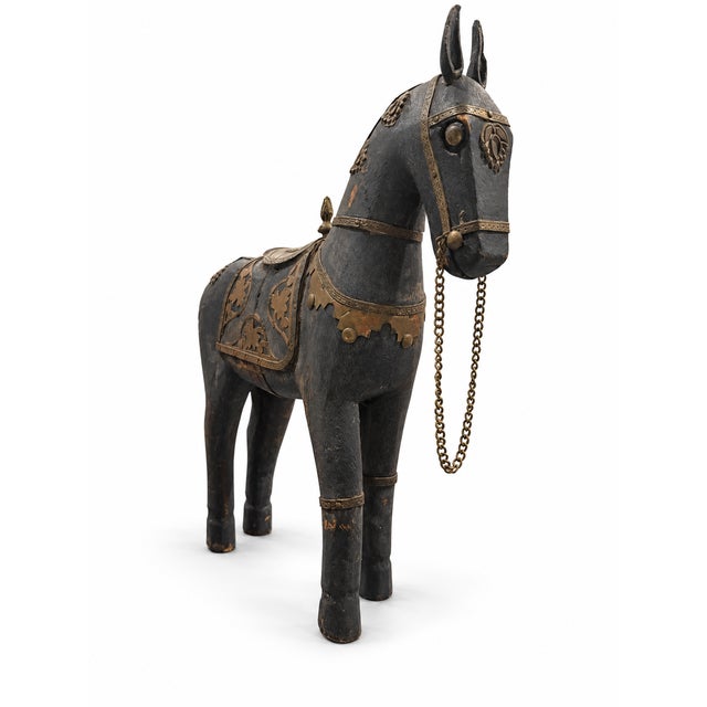 Beautiful vintage Indian folk art horse sculpture, masterfully hand-carved from solid wood with a dark stained finish....