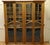 A Rare Piece of Progressive Arts and Crafts furniture, in golden oak and stained glass This Large Bookcase has a...