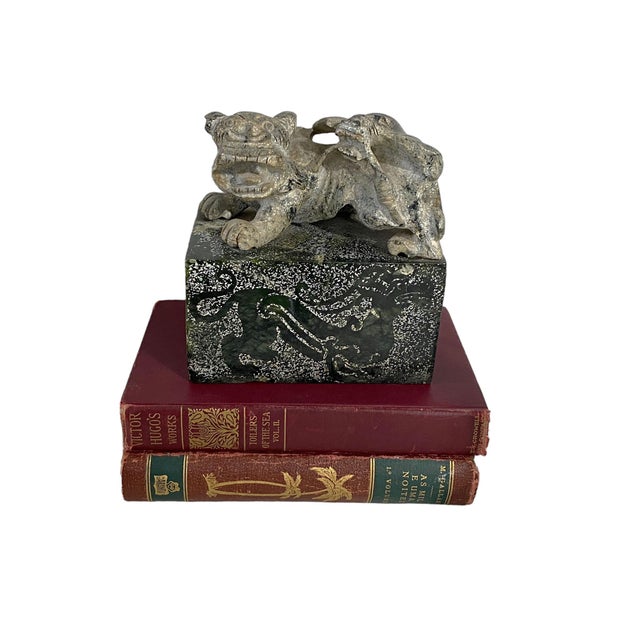 This vintage heavy hand carved soap stone ink stamp seal features a foo dog figure handle with bats on the back of a...