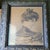 This antique portrait of a woman features a muted palette in an ornate frame with matting. The large print showcases a...