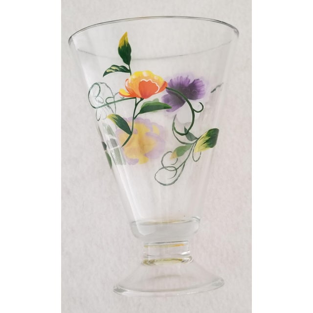 We love this extraordinary hand painted vase for the depiction of an era painted on the surface as well as the fanned out...