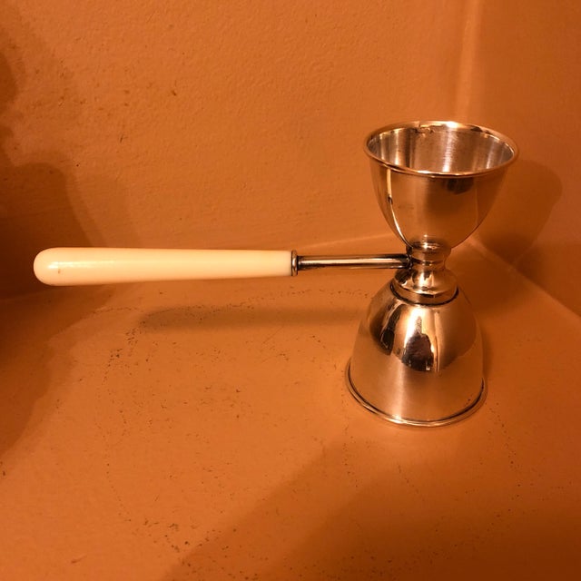Fine and Rare mid century Italian silver double Jigger on a handle. Marked 800 /1000 purity. Silversmith identification -...