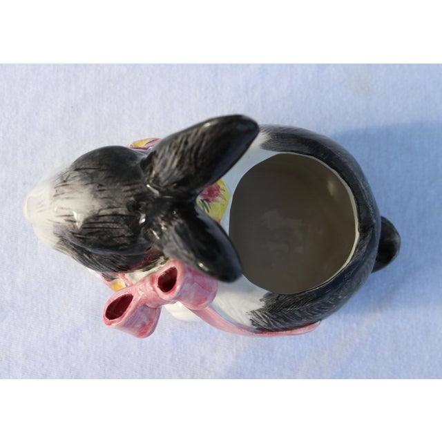 Sweet bunny creamer by Fitz and Floyd. This adorable creamer is from the Pansy Parade line. I love the black and white...