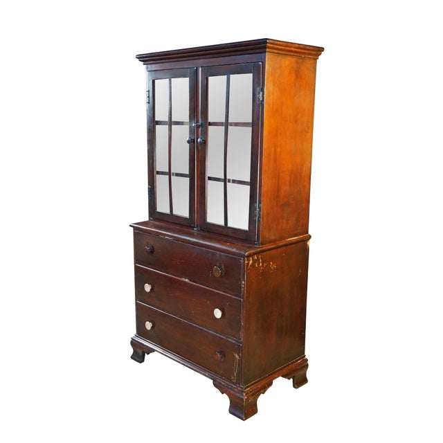 This vintage 1930s–1940s step-back hutch or bookcase is crafted from mahogany, showcasing a rich, dark reddish-brown wood...