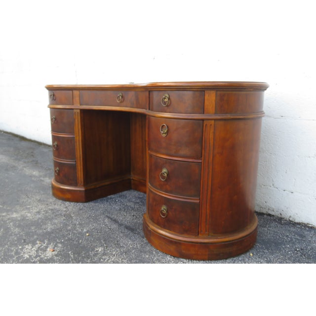 This unique Desk is made of wood, solid wood, flame mahogany, veneer, and metal. The Desk was made by Drexel Heritage, and...