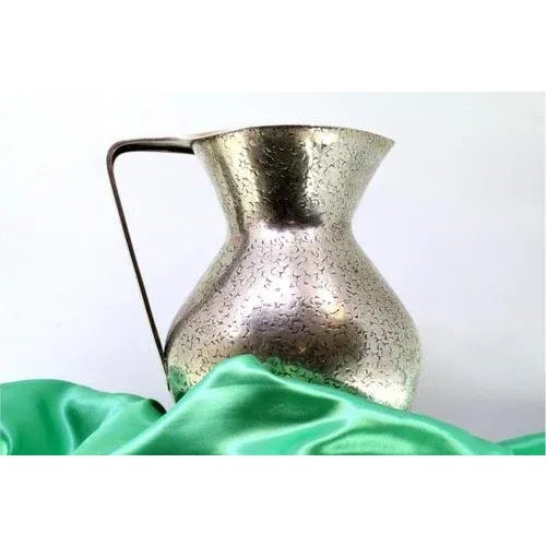 Silver Water Jug and Plate with Engravings, in Very Good conditions. Designed from 2000 This piece has an attribution...