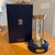 This Limited Edition Millennium 2000 Diamond Brass Hourglass Timer by De Beers features an hourglass filled with over...