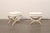 A French pair of reeded wood curule stools, with upholstered seats, from the mid 20th century. These vintage stools from...