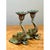 This captivating pair of vintage metal candlesticks features intricately detailed elephants sculpted with upward-curled...